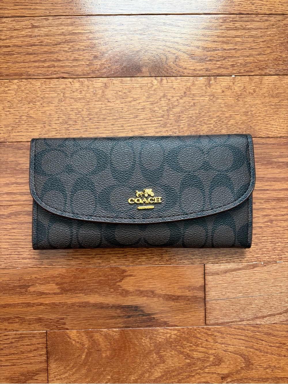 Coach Signature Continental Wallet in Black with Gold Logo